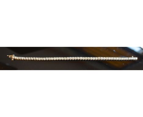 A 14ct. White Gold Round Brilliant Cut Diamond Line Bracelet, approximately 5.51 ct.