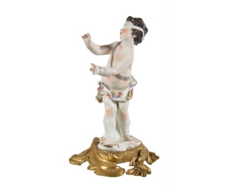 AN EDME SANSOM PORCELAIN GILT METAL MOUNTED MODEL OF A PUTTO, IN THE MEISSEN STYLELATE 19TH CENTURYModelled blindfoldedBlue c