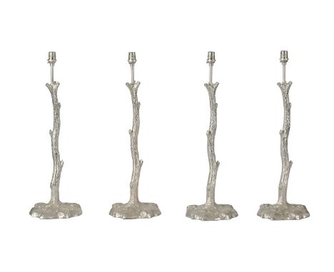 A SET OF FOUR SILVERED METAL TABLE LAMPSOF RECENT MANUFACTUREEach modelled as a tree trunk on a naturalistic base, and with p