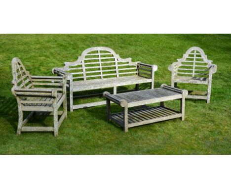 A SUITE OF TEAK GARDEN FURNITUREOF RECENT MANUFACTURE, AFTER THE MANNER OF EDWIN LUTYENScomprising a bench, two armchairs and