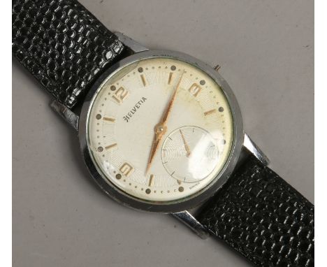 A gentlemans vintage Helvetia stainless steel manual wristwatch with subsidiary seconds.