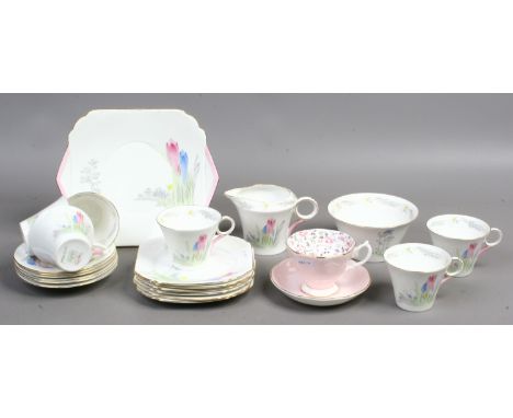 A six part Art Deco Shelley tea service to include milk jug and sugar bowl, along with a Royal Albert 'rose confetti' cup and