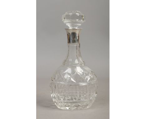 A cut glass decanter and stopper with silver collar, assayed Birmingham 1929.