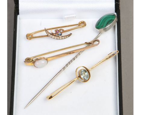 Three gold bar brooches including 9ct, 14ct and 15ct examples one set with an opal along with a silver malachite stick pin.