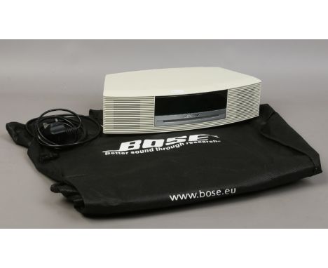 Bose wave music system III clock radio CD player manual and leads/remote. the remote is working intermittently.