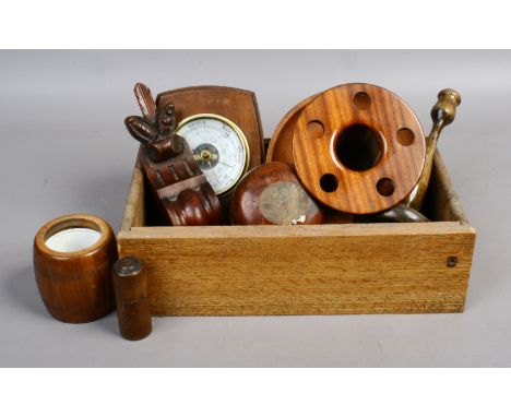 A box lot of carved wooden items barometer, pipe stand, tobacco jar etc.