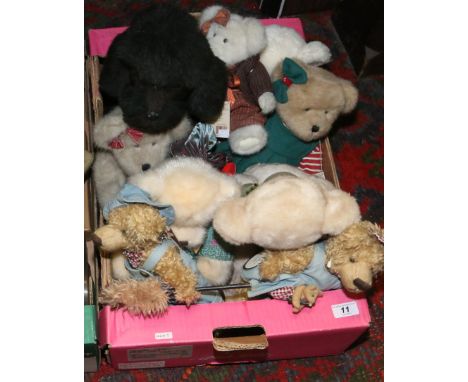 A box of soft toys, teddy bears mainly.