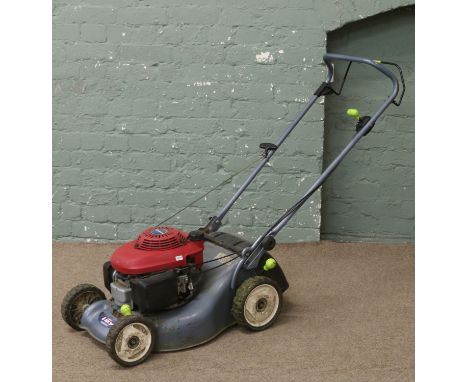A Honda isy lawn mower with easy start 4.5 horse power engine