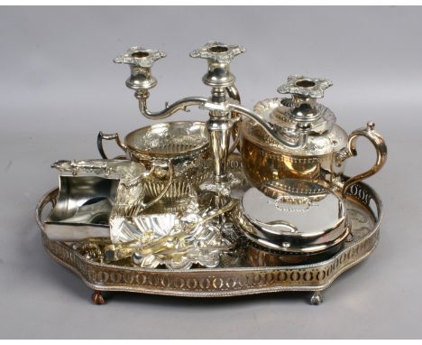 A collection of silver plate to include serving tray, three part tea service, candelabra etc.