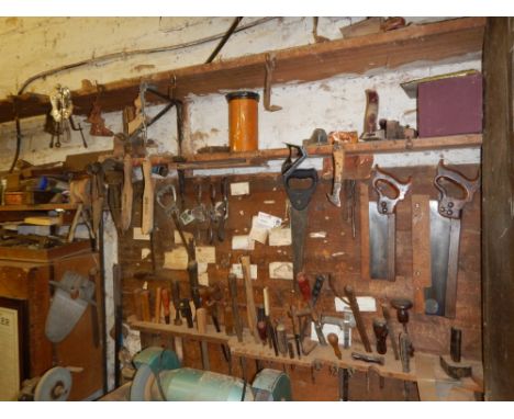 Various woodworking tools, including spoke shaves, tenon saws, mallets, etc. 