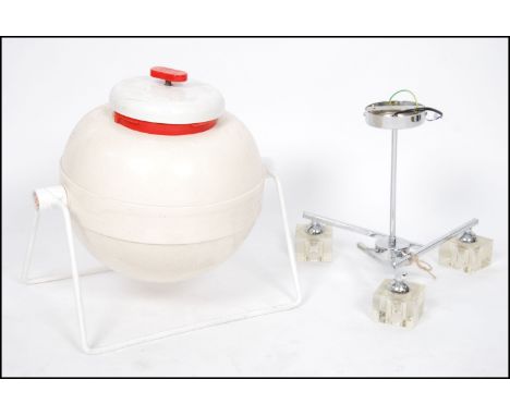 A contemporary chrome and resin set chandelier in the modernist style together with a retro 1970's ice bucket on stand in two