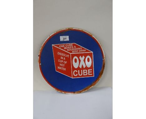 A circular enamel OXO Cube sign, diameter 12ins