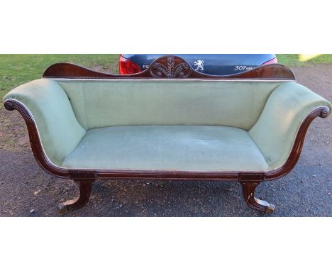 A Regency scroll end sofa, with mahogany frame