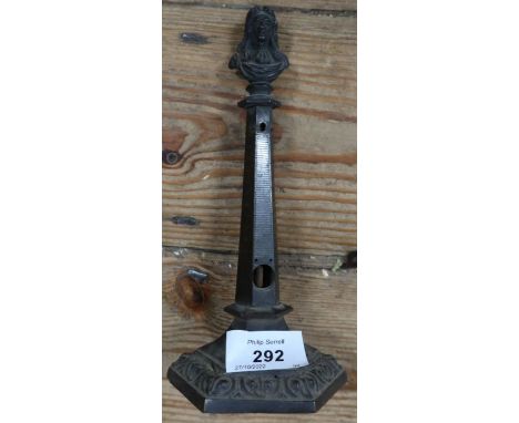 A 19th century style thermometer, with a metal bust of a classical figure on top, missing mercury tube