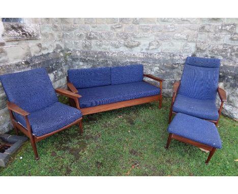 A Guy Rogers teak suite, to include sofa, two recliner chairs and a foot stool, with 'Harris Tweed' upholstery, trade only