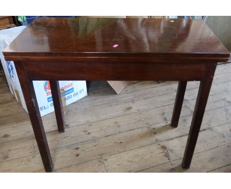 A 19th century mahogany fold over card table, of rectangular form, 34ins x 17ins, height 29ins, together with another 19th ce