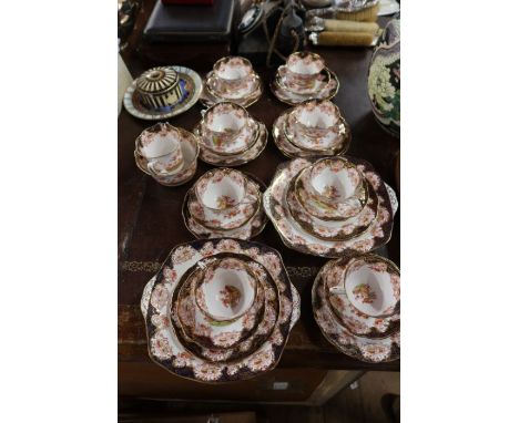 A Royal Albert eight piece tea service, together with two Royal Worcester millennium pieces