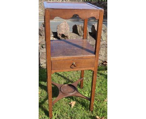 A mahogany two tier bedside table, fitted with a drawer and a plant shelf, 14ins x 14ins, height 33.5ins