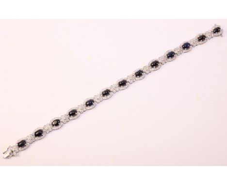 Cabochon sapphire and diamond 18ct white gold bracelet stamped 750   Condition Report   Click here for further images, condit