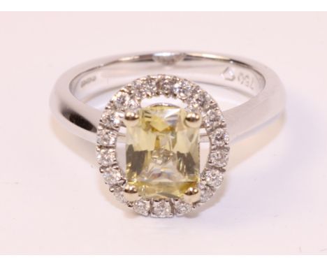 Radiant cut yellow sapphire and diamond cluster white gold ring hallmarked 18ct, sapphire approx 1.3 carat   Condition Report