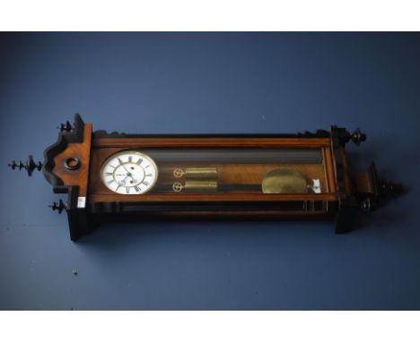 Late 19th century walnut and ebonised Vienna style wall clock, white enamel dial with subsidiary second dial, twin weight dri