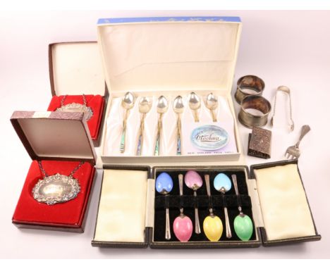 Set of six Ataahua paula shell silver teaspoons, set of six silver and enamel teaspoons (one a.f.), pair of Whisky and Brandy