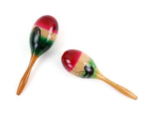 Queen - A pair of wooden Maracas used by Freddie Mercury on stage circa 1979 and also in the recording studio thereafter by h