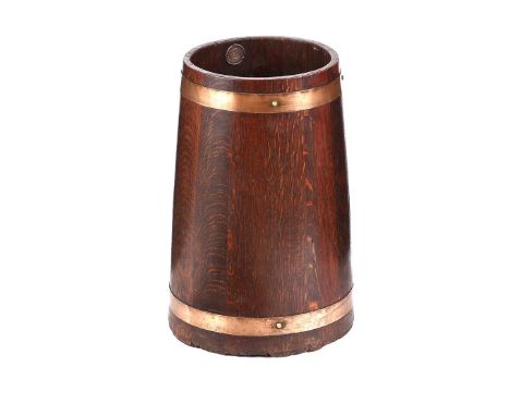 OAK AND COPPER BOUND BARREL STICK STAND. HEIGHT: 15 INCHES.DIAMETER: 10 INCHES.IN GOOD CONDITION.