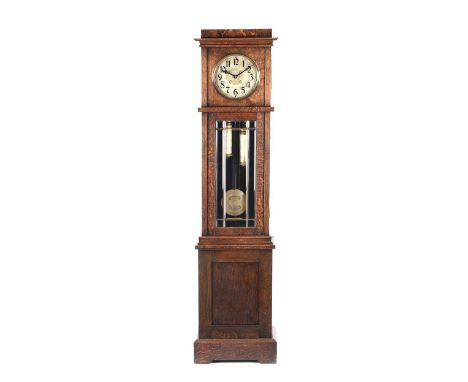 ARTS & CRAFTS OAK LONGCASE CLOCK WITH A CIRCULAR DIAL OF 11 INCHES AND A BEVELLED GLASS DOOR. HEIGHT: 79 INCHES.WIDTH: 18 INC