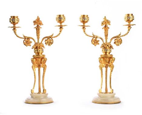 PAIR OF ANTIQUE GILT AND ENAMEL CANDELABRA RAISED ON A CIRCULAR MARBLE BASE.HEIGHT: 13 INCHES.WIDTH: 8 INCHES.DEPTH: 4 INCHES