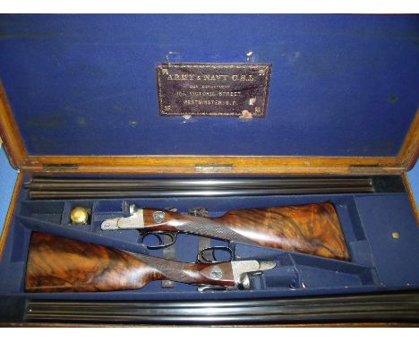 William Golden pair of 12 bore box lock ejector shoguns, No 35210 & 35211, the greener actions with best bouquet and foliate 