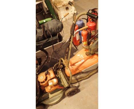 Vintage Hayterette four wheel petrol rotary mower with Briggs and Stratton engine 