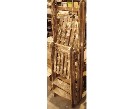 Two pairs of wooden step ladders one 4 step and one 2 step