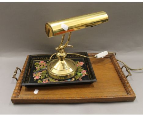 A brass adjustable student's lamp, two trays and a modern plate rack. The latter 57 cm wide.