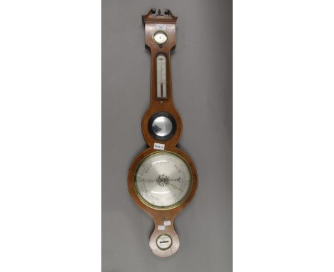 A 19th century mahogany banjo barometer. 