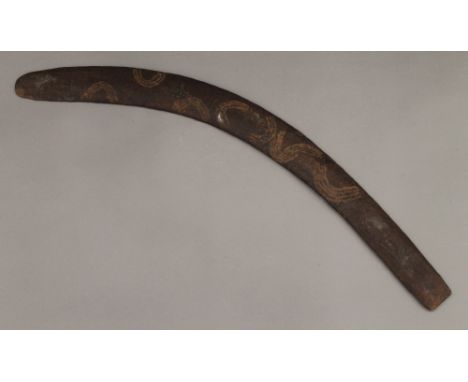 An Aboriginal boomerang. 72 cm long.