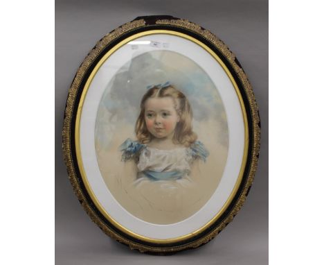 A Victorian portrait of a girl, pastel, framed and glazed. 65 cm high.