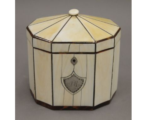 An 18th century ivory tea caddy. 13 cm high.