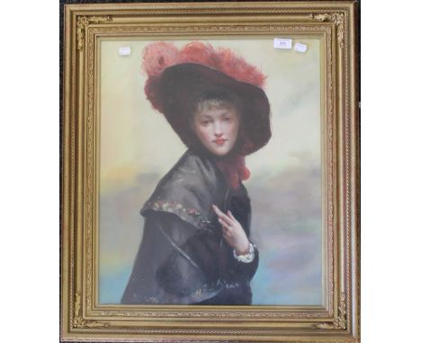 An oil on canvas, portrait of a young lady in a feathered hat, framed and glazed. 48 x 58 cm.