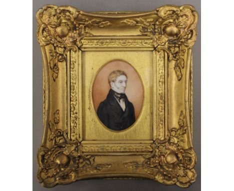 A 19th century gilt portrait miniature on ivory of a gentleman, framed and glazed. 19 x 22 cm overall.