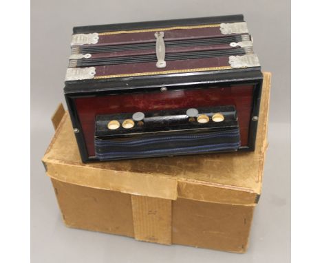 A Sterling Melodeon accordion. 25.5 cm wide.