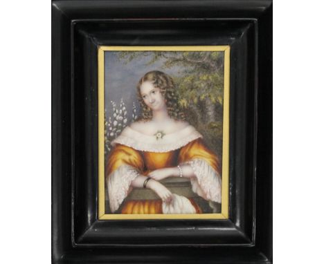 A 19th century miniature portrait on ivory of a young lady, framed and glazed. 8 x 11 cm.