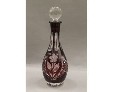 A Bohemian ruby flash glass decanter. 32 cm high.
