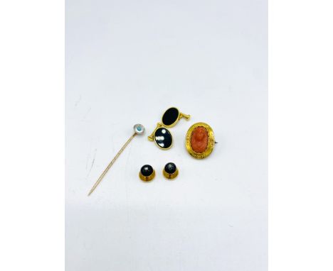 9ct gold stick pin, 1g; gold coloured brooch set with a coral cameo; pair of gold coloured studs each set with a diamond; pai