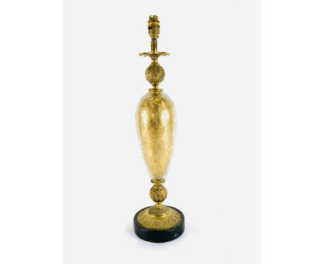 Brass coloured table lamp with crackle glass middle section, height 60cms. No wires included. Estimate £20-40.