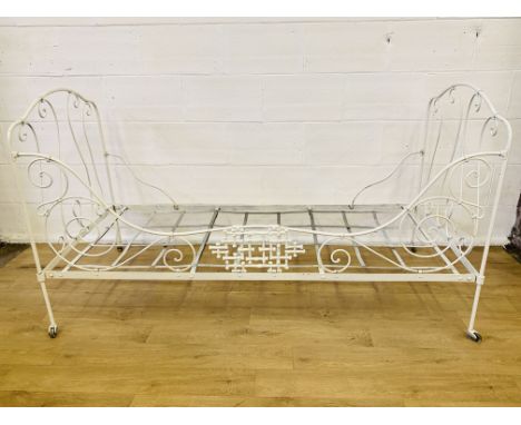 19th Century French white painted wrought iron daybed, 192 x 91 x 106 cms. Estimate £45-80