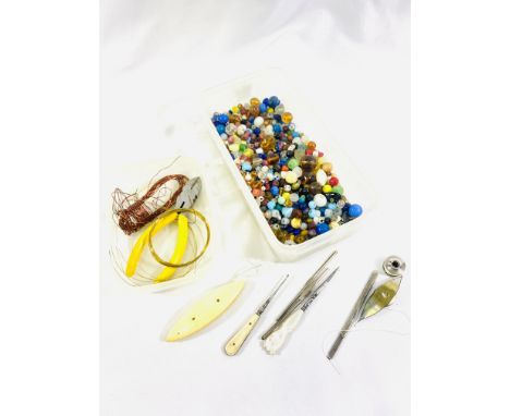 A collection of beads for lace bobbins together with tools and wire. Estimate £20-40