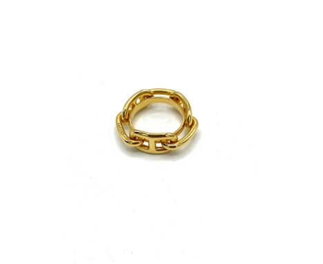 Hermes gold tone ring. Estimate: £40-60