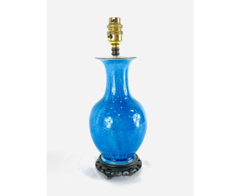 Ceramic blue vase later converted to a lamp, 32cms. The wood base of this lamp is damaged. No wires included. Estimate £20-40