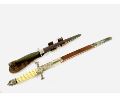 A military dagger marked to blade P.O &amp; Co, 43cm in leather scabbard; a military dagger, 30cm, in leather sheath. Estimat